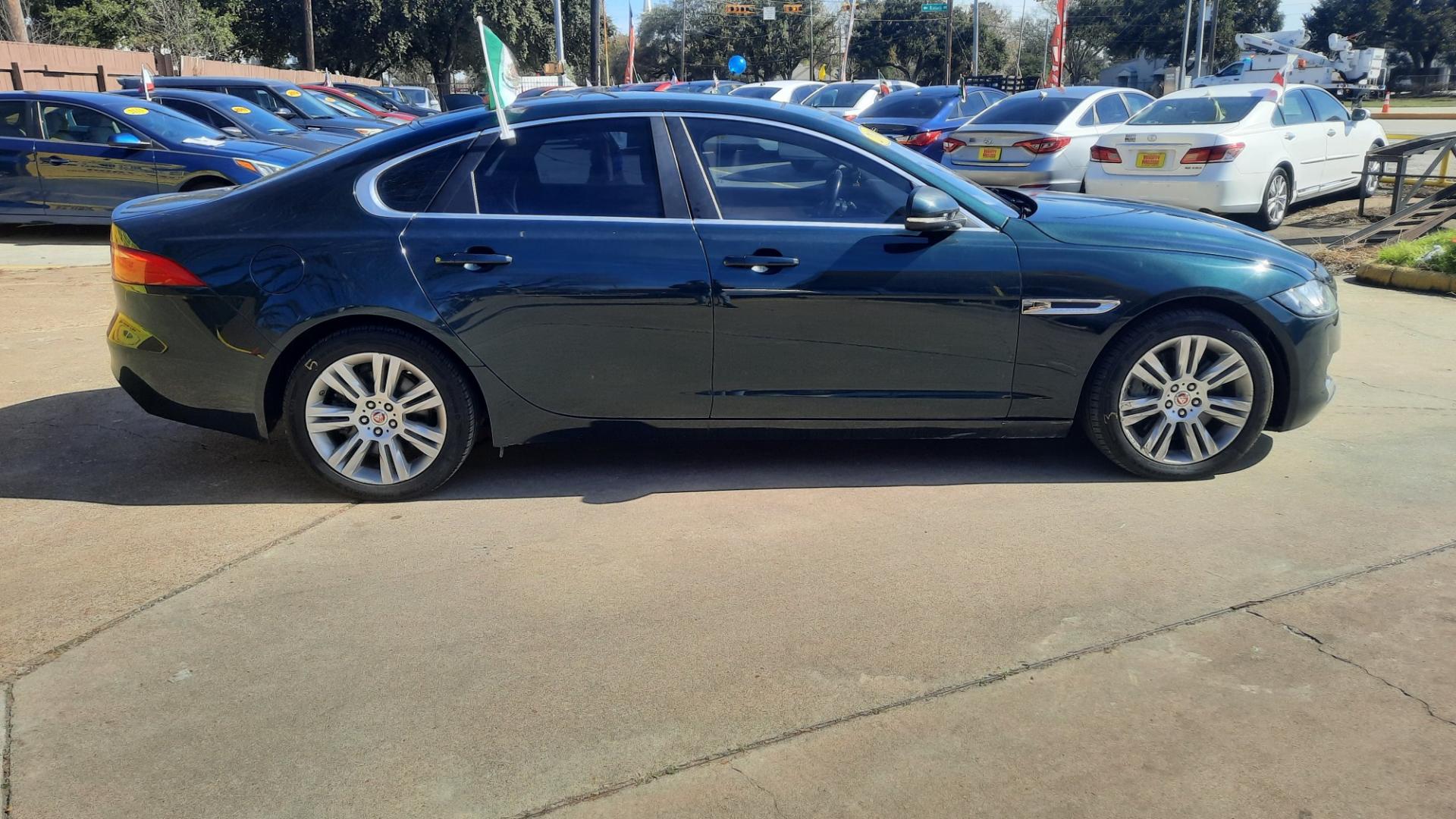 2016 Jaguar XF-Series (SAJBD4BV5GC) , located at 16710 Clay Rd., Houston, TX, 77084, (281) 859-7900, 29.834864, -95.656166 - Photo#1